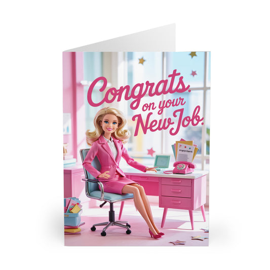 Card with a woman Doll in a pink office setting and 'Congrats on your New Job' text.